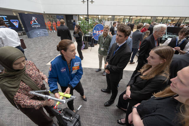 The Astro Anchors talk with an astronaut about their project